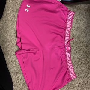 Bright pink under armor running shorts